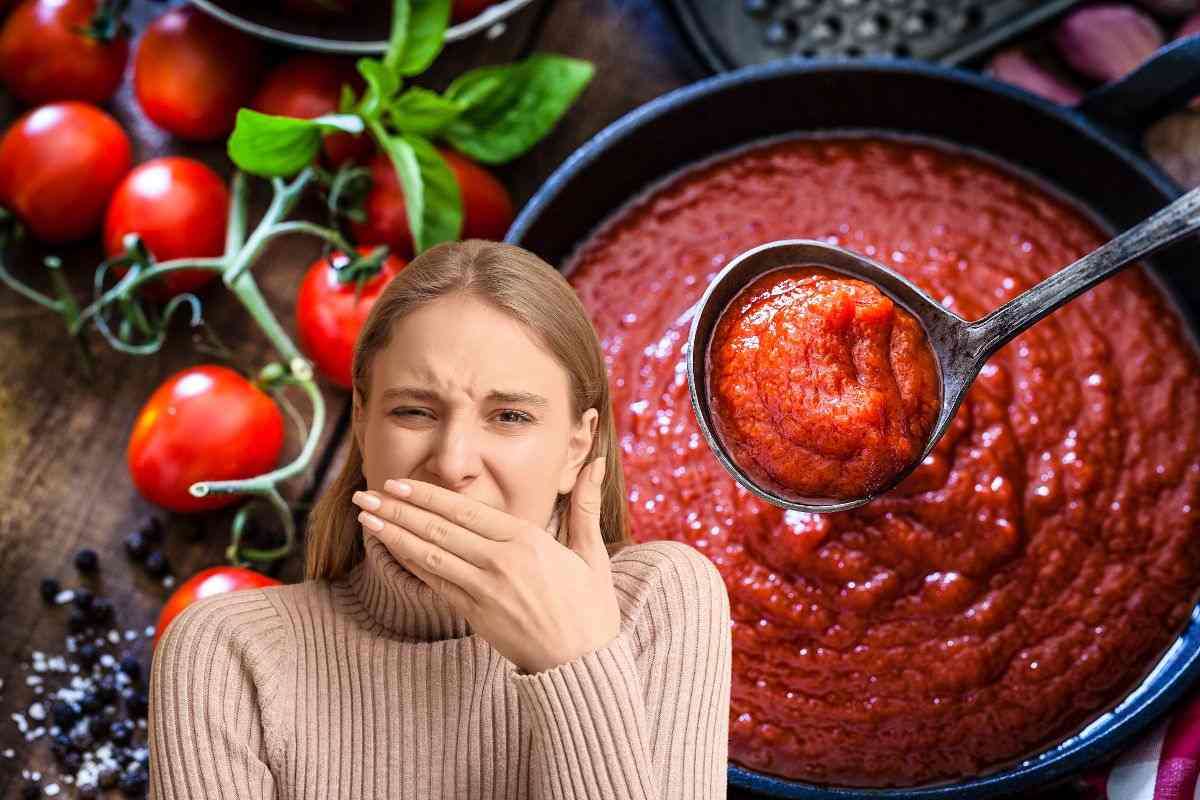 donna disgustata da un sugo di pomodoro non buono